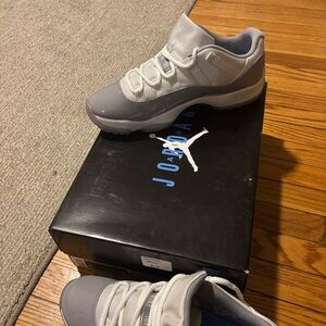 Jordan 11 Low Top Light Gray and White Sneakers